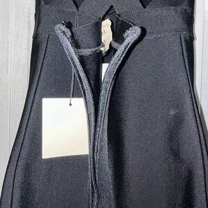 Herve Leger black bondage dress.